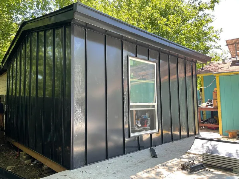 Black standing seam metal wall panels for Metal Roof Installation in Roeland Park