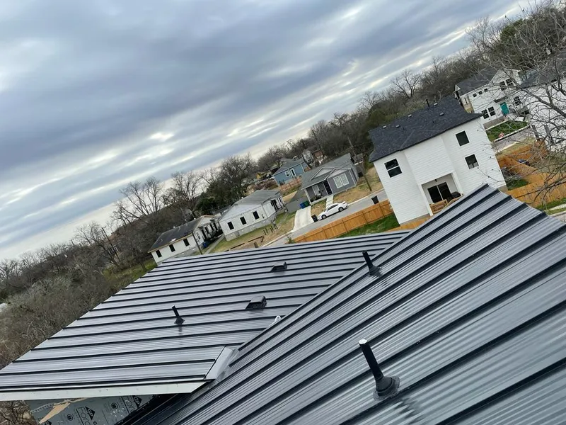 Standing seam metal roof panels with vents for Skylight Repair in Roeland Park